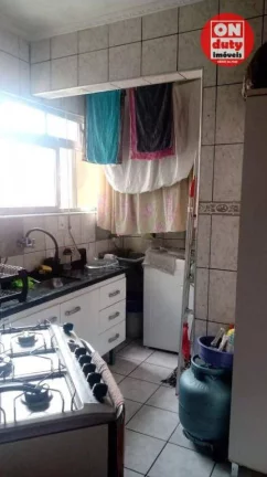 Imagem Apartamento com 2 dormitórios à venda, 64 m² por R$ 220.000,00 - Saboó - Santos/SP