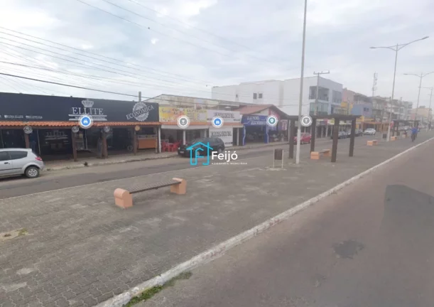 Imagem Casa 2 dormitórios com suíte, pátio frente e fundos e garagem coberta no Centro de Cidreira