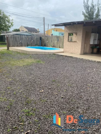 Imagem Imóvel com Piscina Poucos Metros do Mar
