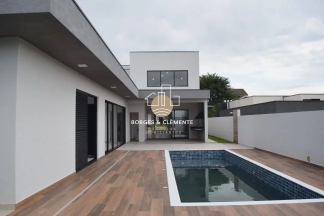 Imagem Casa com 4 Suítes e Design Moderno em condomínio