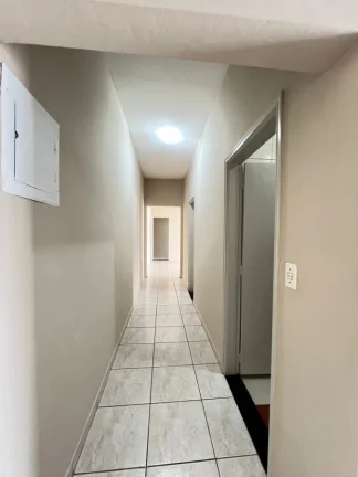 Imagem Casa para Venda em Praia Grande, Caiçara, 2 dormitórios, 1 suíte, 3 banheiros, 3 vagas