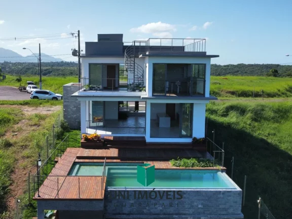 Imagem Casa de luxo com 4 suítes à venda no Condomínio Reserva Amary em Guarapari-ES