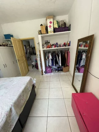 Imagem Casa com 2 dormitórios à venda, 95 m² por R$ 390.000,00 - Caiçara - Praia Grande/SP