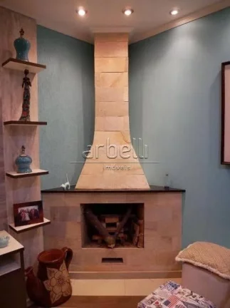 Imagem Sobrado com 170 metros quadrados de área construída, ampla sala com lareira e teto rebaixado com s...