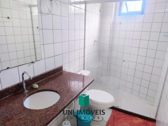 Imagem Oportunidade no Centro de Guarapari: Apartamento Amplo com 2 Quartos + Quarto Reversível e garagem