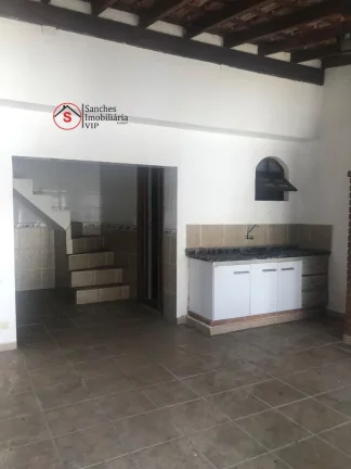 Imagem Sobrado à Venda em Santo Andr?(C) com 2 dormitórios , sala, cozinha, banheiro e lavanderia,com garagem coberta para dois carros. Fundos com quintal gran