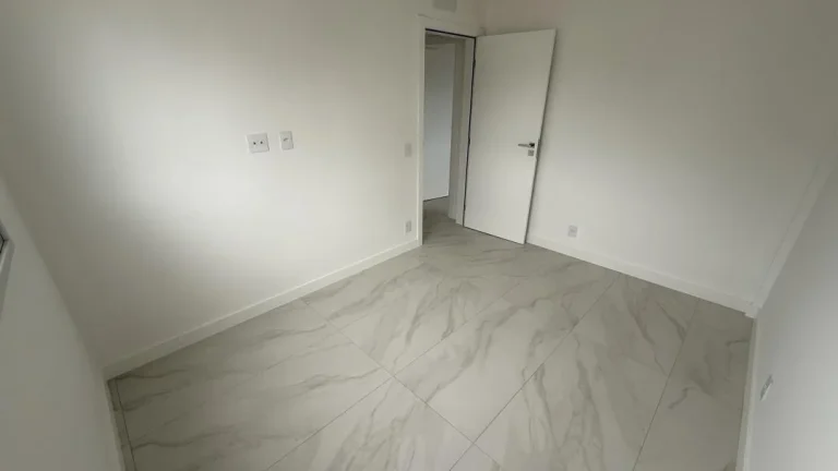 Imagem Apartamento novo de 74 m² com 2 quartos, sendo 1 suíte no bairro Fazenda em Itajaí a venda com Adriano Carpes Imóveis.