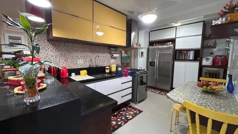 Imagem Sobrado com 2 dormitórios à venda, 89 m² por R$ 900.000 - Marapé - Santos/SP
