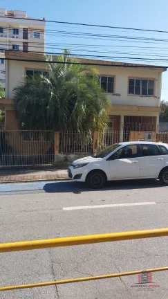 Foto do imóvel Casa com 7 Quartos à Venda, 163 m² em Coqueiros - Florianópolis