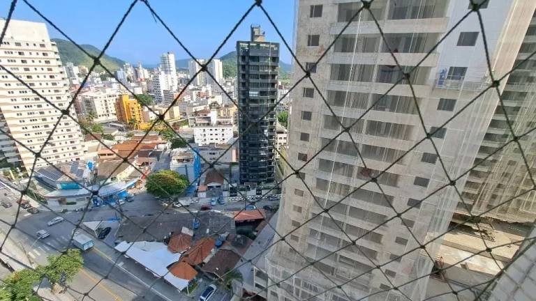 Imagem APARTAMENTO 30 METROS DA PRAIA DAS ASTÚRIAS COM 2 VAGAS PARA AUTO E LAZER