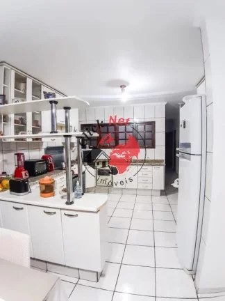 Imagem Sobrado com edícula e salão comercial à Venda no bairro Parque das Nações em Santo André