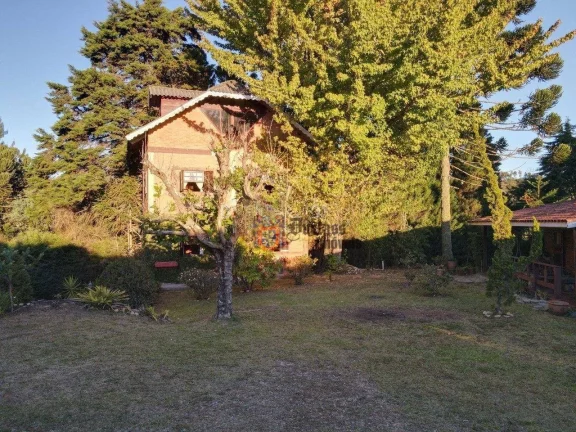 Imagem Casa com 3 dormitórios à venda, 280 m² por R$ 1.220.000 - Alto Do Capivari - Campos do Jordão/SP