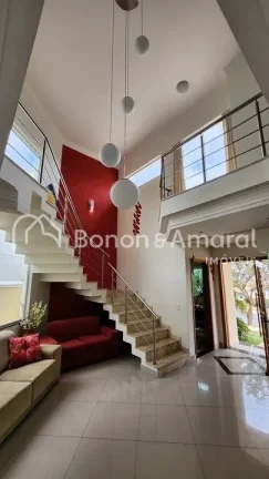 Imagem Lindo sobrado com 3 suites, sendo uma Master, escritório, piscina aquecida, área Gourmet, living c...