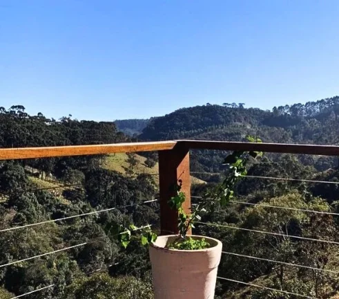 Imagem Studio Loft em Gonçalves: Design, Silêncio e Vista Privilegiada