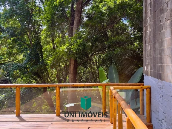 Imagem Triplex à venda em bairro nobre de Guarapari com área gourmet e deck para lagoa