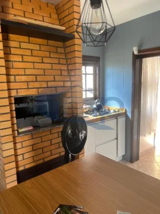 Imagem Casa a venda com 3 dormitorios na Praia Paraiso em Torres/RS