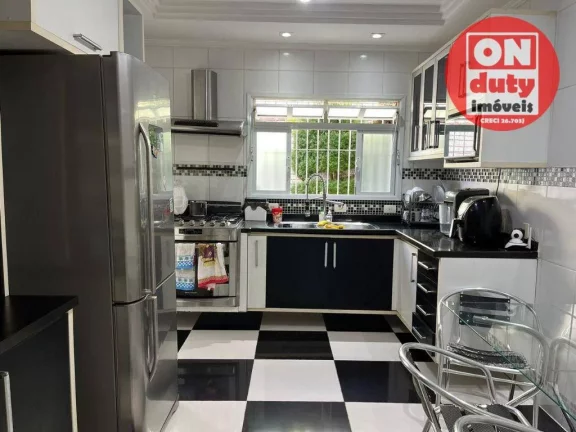 Imagem Casa à venda, 149 m² por R$ 1.100.000,00 - Macuco - Santos/SP