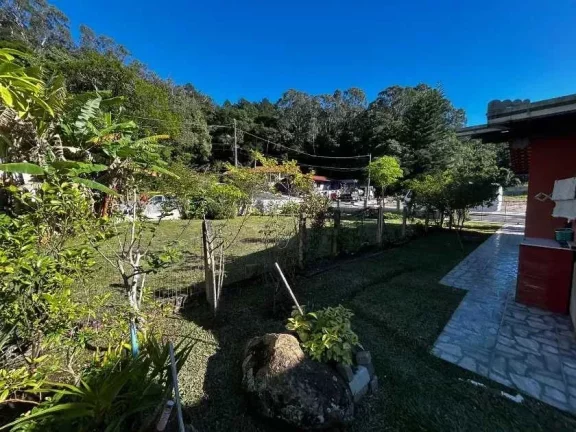 Imagem Terreno com 566,50 m² e casa no Centro de Porto Belo