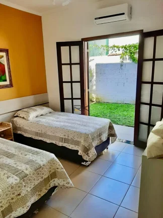 Imagem CASA A VENDA NAS TONINHAS COM 4 SUÍTES,SALA,COZINHA,2 VAGAS DE GARAGEM