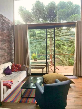 Imagem Studio Loft em Gonçalves: Design, Silêncio e Vista Privilegiada
