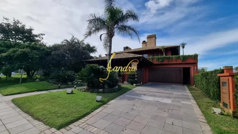 Imagem Sobrado no Centro de Xangri-la com 05 dormitórios com piscina