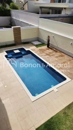 Imagem Lindo sobrado com 3 suites, sendo uma Master, escritório, piscina aquecida, área Gourmet, living c...