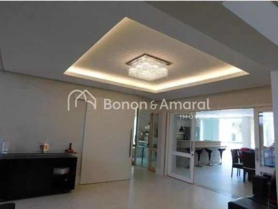 Imagem Casa em condomínio com 410 m² e 4 quartos