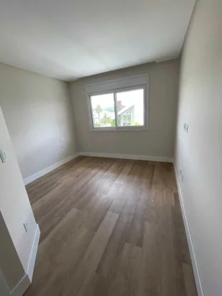 Imagem Casa nova com 4 suítes e 4 vagas privativas de garagem em condomínio fechado em Camboriú/SC