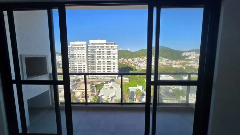Imagem Apartamento vista mar com 3 suítes e 2 vagas de garagem na Praia Brava