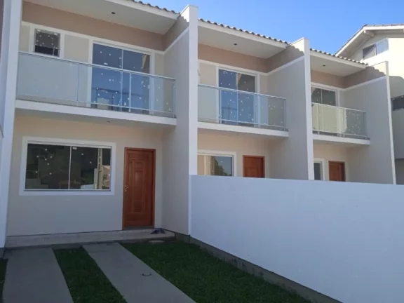 NOVO - 2 SUÍTES - QUINTAL FRENTE E FUNDOS - TOTAL PRIVACIDADE- SÃO JOSE - SC