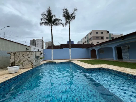 Imagem Casa para Venda em Praia Grande, Caiçara, 2 dormitórios, 1 suíte, 3 banheiros, 3 vagas