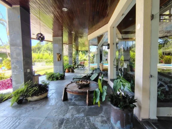 Imagem Espetacular Casa em Condomínio do Guarujá-SP - 4 Quartos, 4 Suítes, 5 Salas, 6 Vagas, 631,64m².