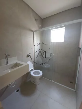 Imagem Casa para Venda em Praia Grande, Mirim, 2 dormitórios, 1 suíte, 3 banheiros, 3 vagas
