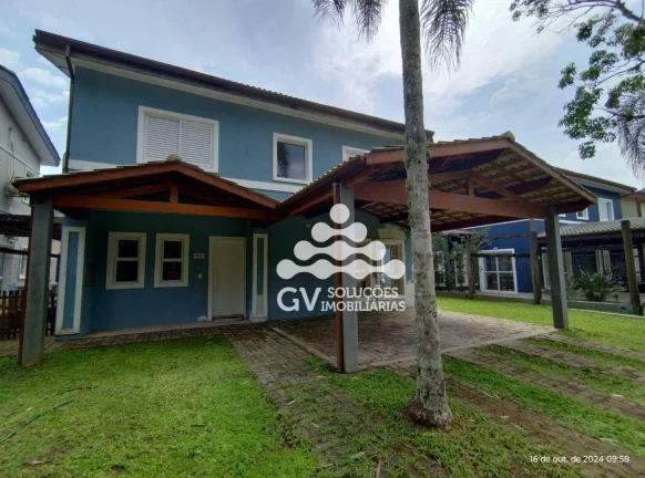 Imagem Casa com 4 dormitórios à venda, 210 m² por R$ 1.500.000,00 - Condomínio Capitanias - Ubatuba/SP