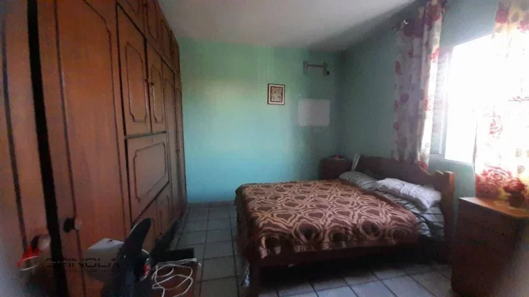 Imagem Sobrado com 5 dormitórios à venda, 346 m² por R$ 950.000,00 - Mirim - Praia Grande/SP