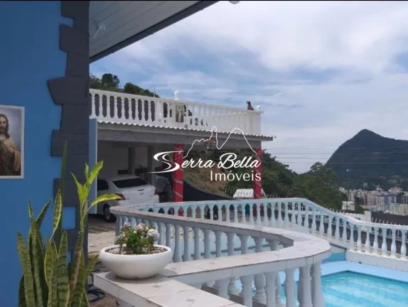 Imagem Casa com 4 dormitórios à venda, 242 m² por R$ 850.000,00 - Fazendinha - Teresópolis/RJ