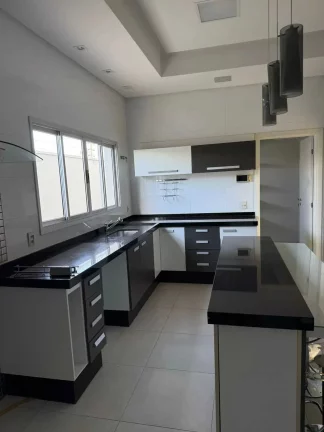 Imagem Casa alto padrão com 4 suítes 2 dormitórios e 4 vagas na garagem no Jardim riva