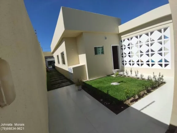 Imagem Casa de Alto Padrão na Aruana: 5 quartos, 4 suítes, posição Leste - Confira!