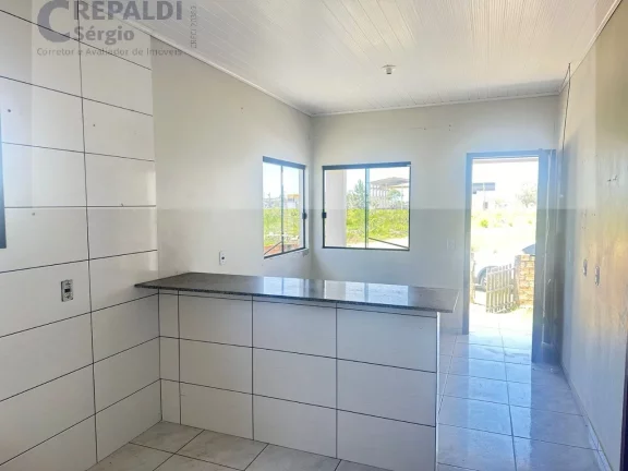 Imagem Casa à venda em Balneário Rincão-SC: 3 quartos, sala, banheiro, garagem e 70m² de área!
