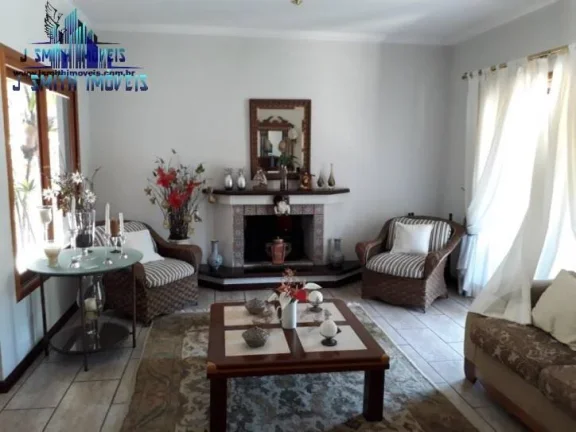 Imagem CASA 4 SUÍTES AMPLAS, PISCINA, 6 VAGAS, PAISAGISMO. COND. SP II