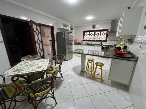 Imagem Sobrado à venda em Peruíbe/SP Condomínio Bougainville II Porteira fechada