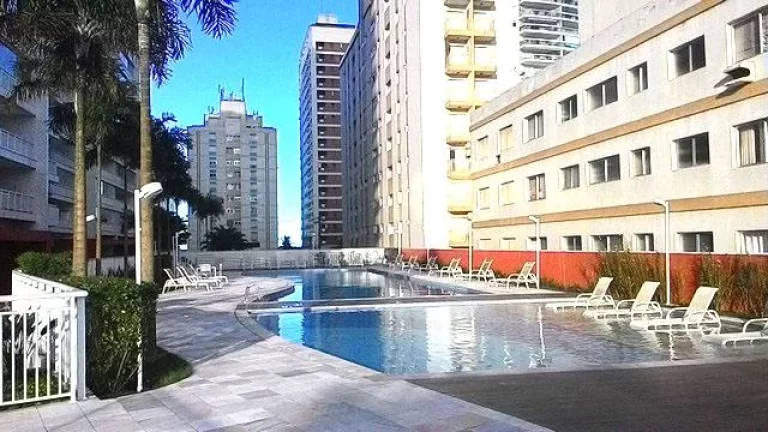 Imagem ASTÚRIAS- MARAVILHOSA ÁREA DE LAZER , 02 VAGAS DE GARAGEM , UMA QUADRA DA PRAIA .
