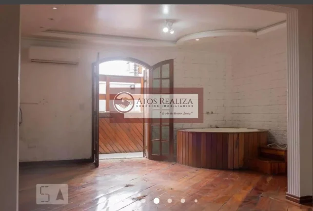 Imagem Vendo Residência no Jardim Palmares. Sobrado de alto Padrão na região de jardim marajoara, 450m2 de área útil, com 3 Dormitorios com Armários Planejados e Ar-condicionado, 2 Salas, Cozinha com planejados, 4 banheiros, 4 Vagas de garagem, Banheira, Piscina