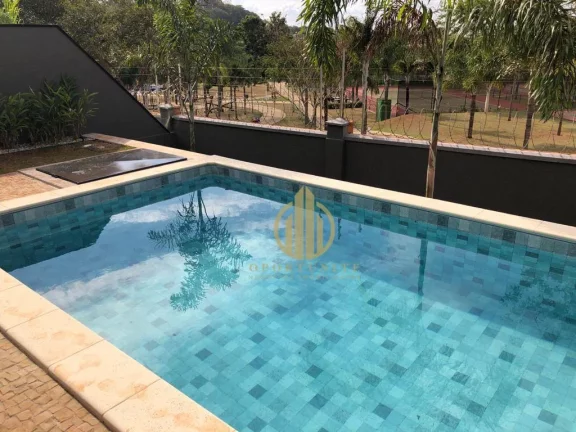 Imagem Sobrado com 4 suítes com piscina integrada na área de lazer no Alphaville