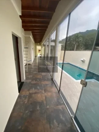Imagem Casa em Condomínio para Venda em Ubatuba / SP no bairro Horto Florestal