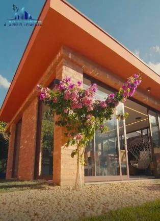 Imagem CASA TÉRREA ESTILO NORMANDO, 4 SUÍTES, TERRENO 1.107m², COND. NA GRANJA