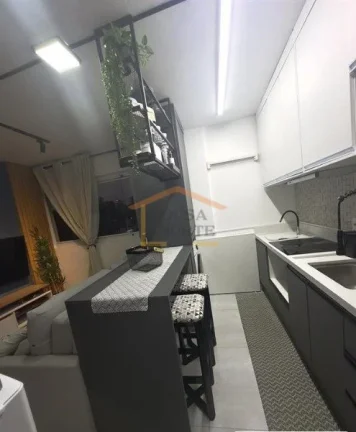Imagem Apartamento 2 dormitórios, sala integrada com cozinha planejada, banheiro, área de serviço, vaga ...