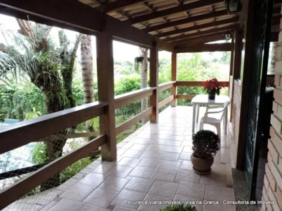 Imagem Muita privacidade com paisagismo tropical, piscina, 5 dormitórios e área gourmet completa.