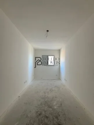 Imagem Apartamento de 2 dormitórios sendo 1 suíte, prédio frente mar no bairro Vila Mirim - Praia Grande