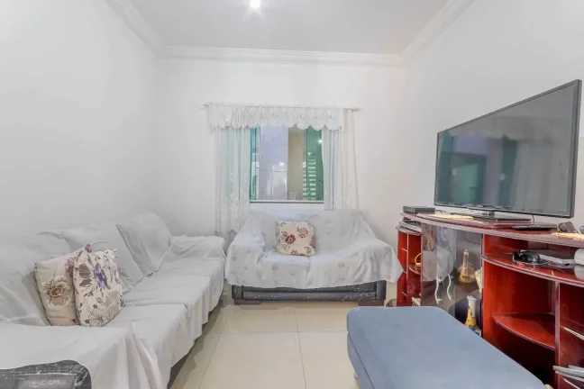 Imagem Casa com 3 suítes e 2 vagas de garagem no Centro de Balneário Camboriú.